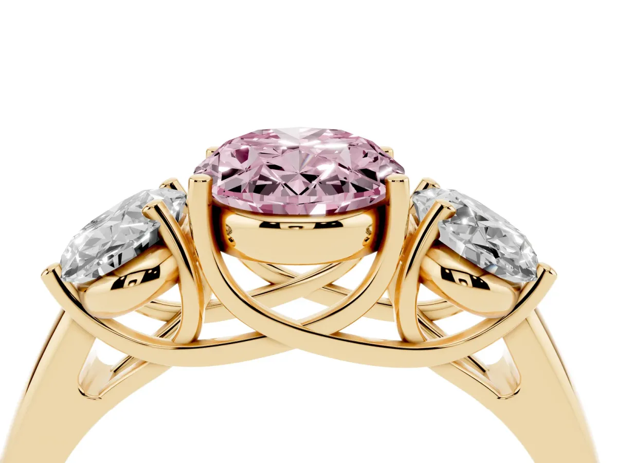 Fancy Pink Three-Stone Oval Cut Diamond Engagement Ring with Prong Setting Yellow gold
