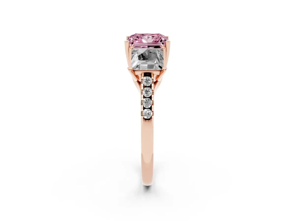 Fancy Pink Three-Stone Princess Cut Diamond Ring with Round Pavé Band and Prong Setting Rose gold