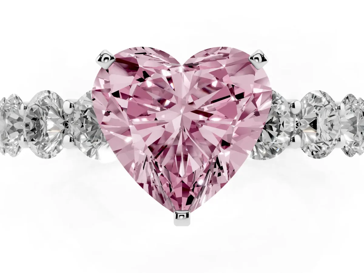 Fancy Pink Heart Cut Diamond Prong Setting with Side Stones on a Pave Band Silver