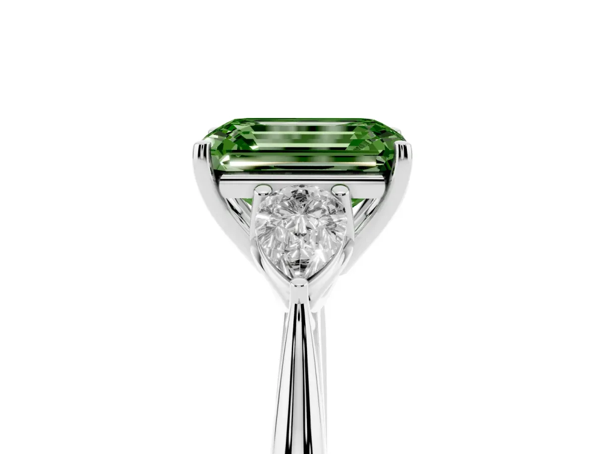 Fancy Green Three-Stone Emerald Cut Diamond Ring with Pear Side Stones in Four-Prong Setting Silver