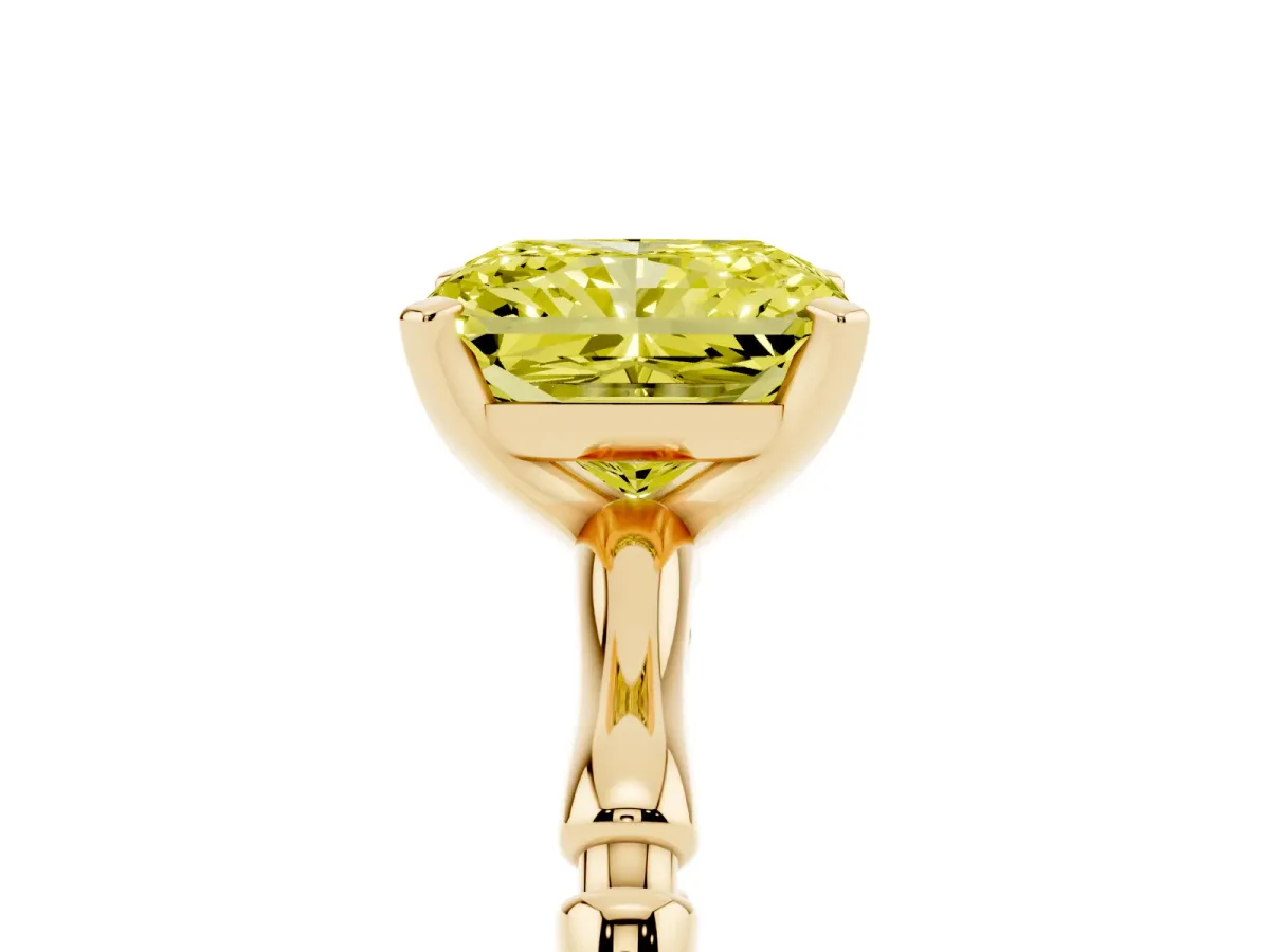 Fancy Yellow Radiant Cut Solitaire Diamond Ring with Bamboo Band and Four-Prong Setting Yellow gold