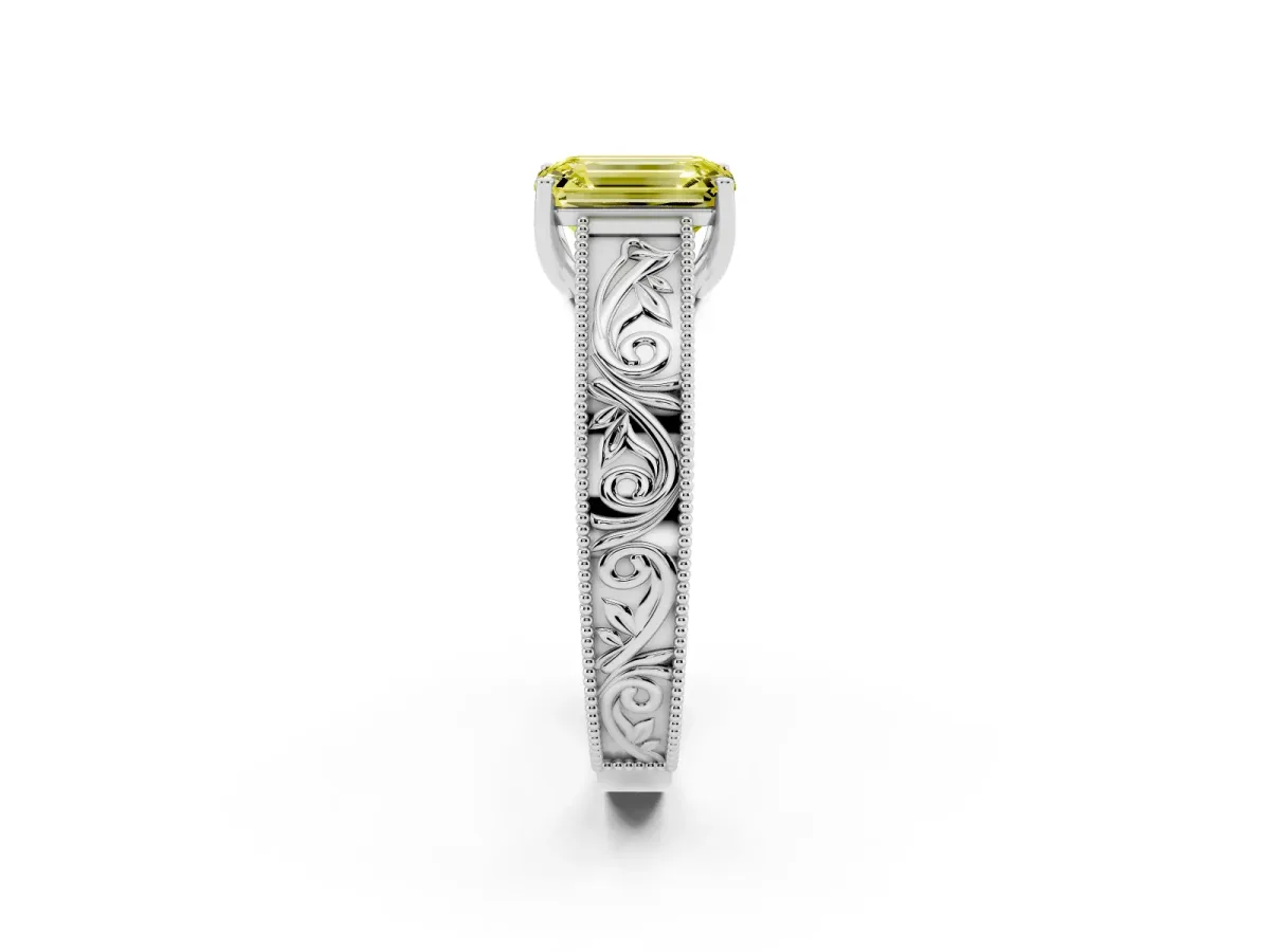 Fancy Yellow Emerald Cut Diamond Solitaire Ring with Engraved Band and Four-Prong Setting Silver