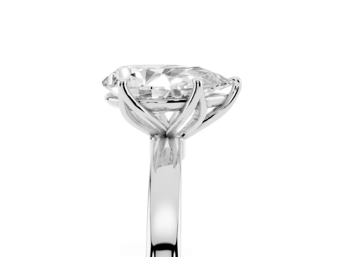 Pear Cut Diamond Solitaire Ring with Thin Band and Prong Setting Platinum
