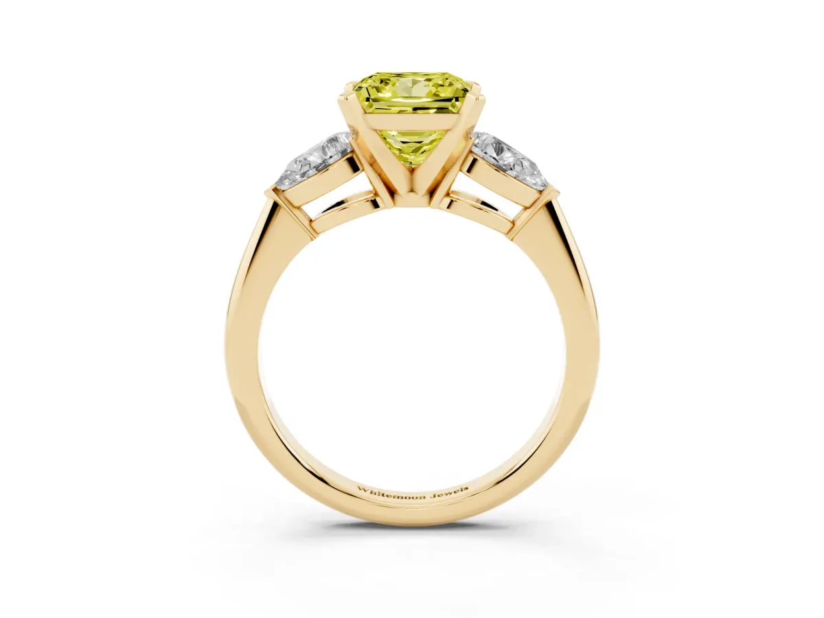 Fancy Yellow Three-Stone Princess Cut Diamond Ring with Pear Side Stones and Four-Prong Setting Yellow gold