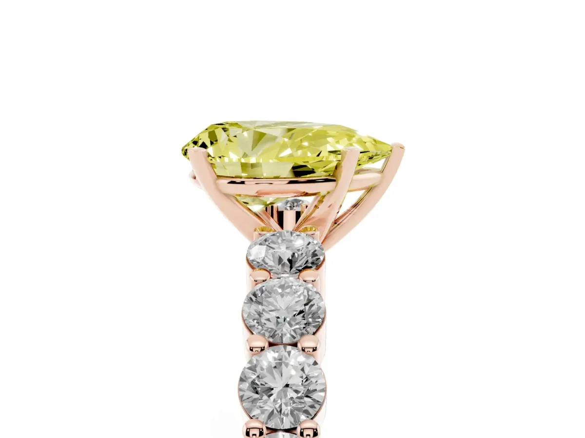 Fancy Yellow Pear Cut Diamond Solitaire Ring with Shared Prong Round Side Stones Rose gold