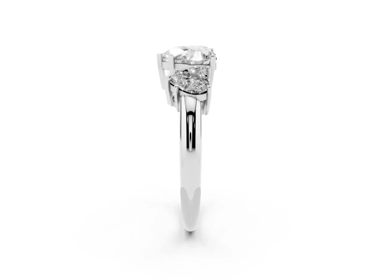 Three-Stone Heart Cut Cut Diamond Engagement Ring with Prong Setting on a White Gold Band Silver