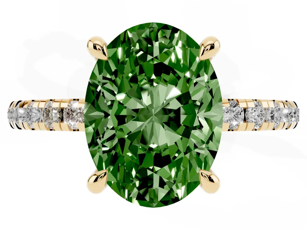Fancy Green Oval Cut Diamond Brilliant Solitaire Ring with Pavé Band and Four-Prong Setting Yellow gold