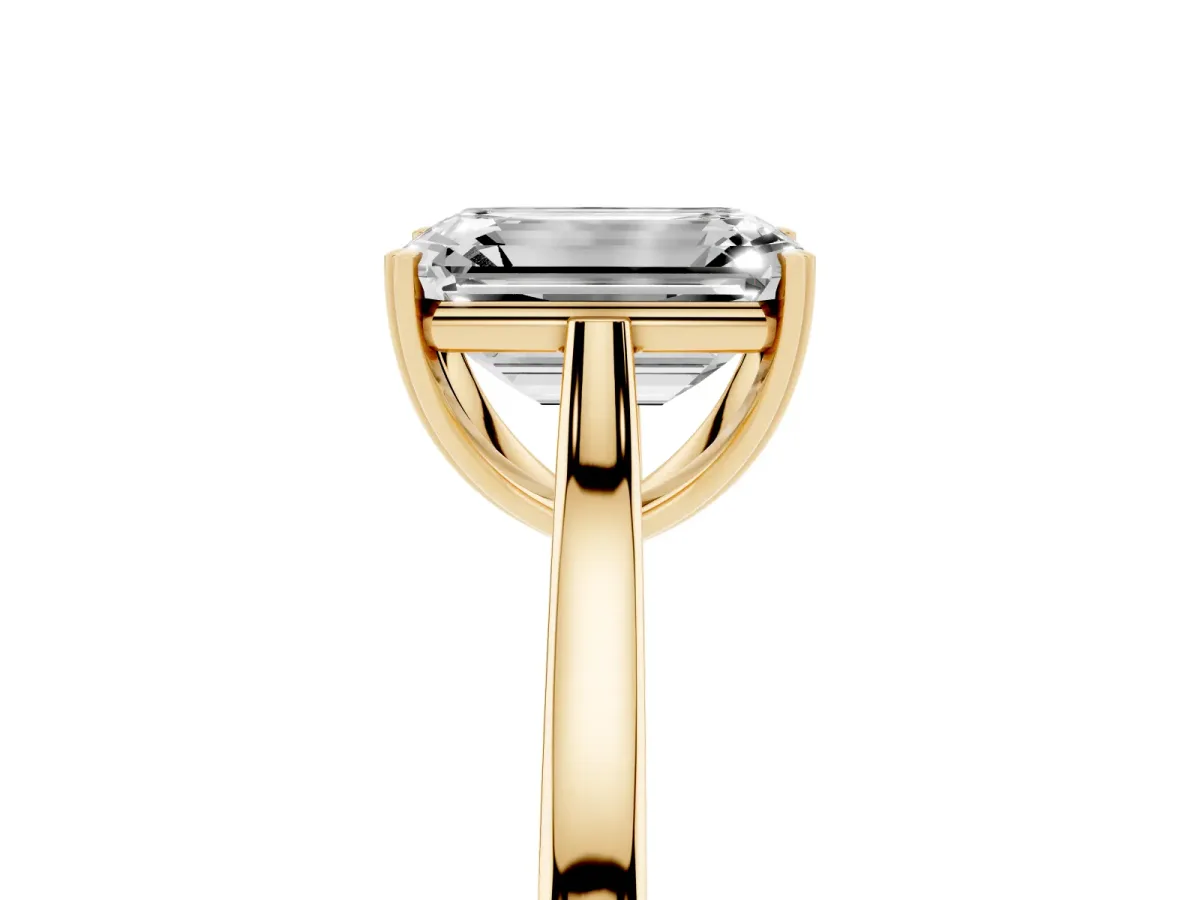 Emerald Cut Solitaire Heart Prong Engagement Ring with Tapered Band Yellow gold