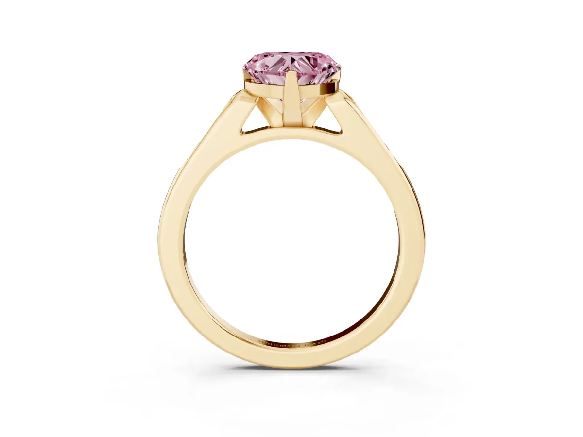 Fancy Pink Heart Cut Diamond Solitaire Ring with Channel Set Round Band and Prong Setting Yellow gold