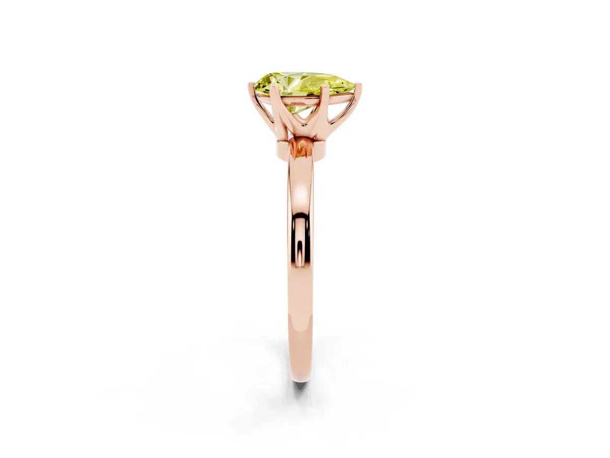 Fancy Yellow Pear Cut Solitaire Diamond Ring with Six-Prong Setting on a Classic Band Rose gold