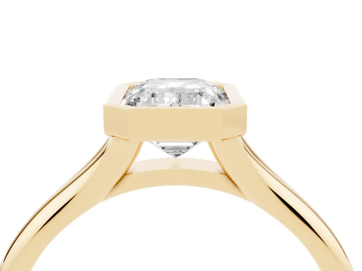Bezel Set Emerald Cut Solitaire Diamond Ring with Smooth Band Yellow gold