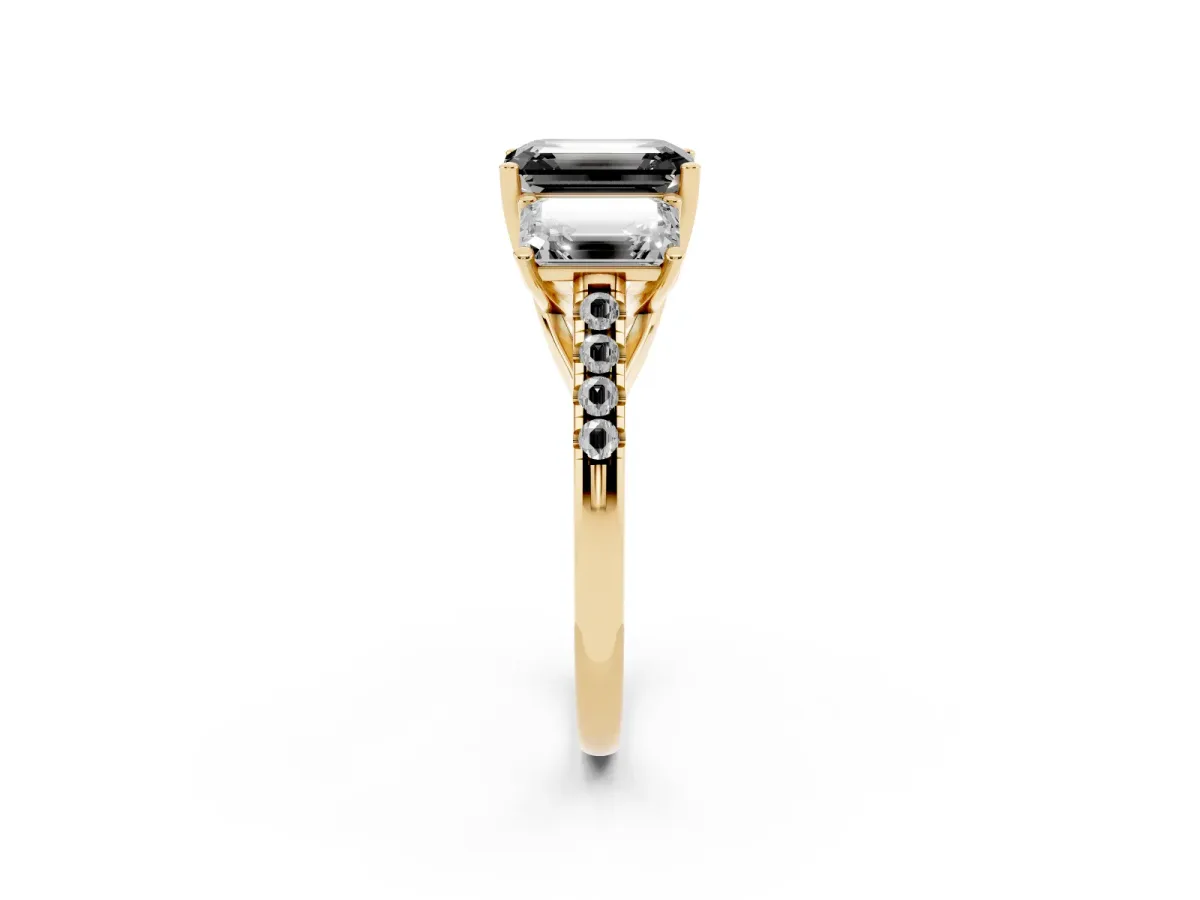 Fancy Black Three-Stone Emerald Cut Diamond Ring with Round Pavé Band and Prong Setting Yellow gold