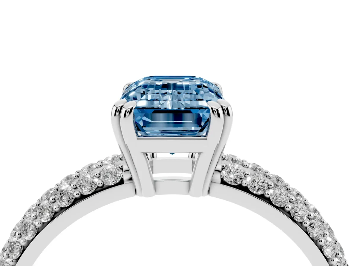 Fancy Blue Emerald Cut Diamond Solitaire Ring with Multi-Row Round Pavé Band and Prong Setting Silver