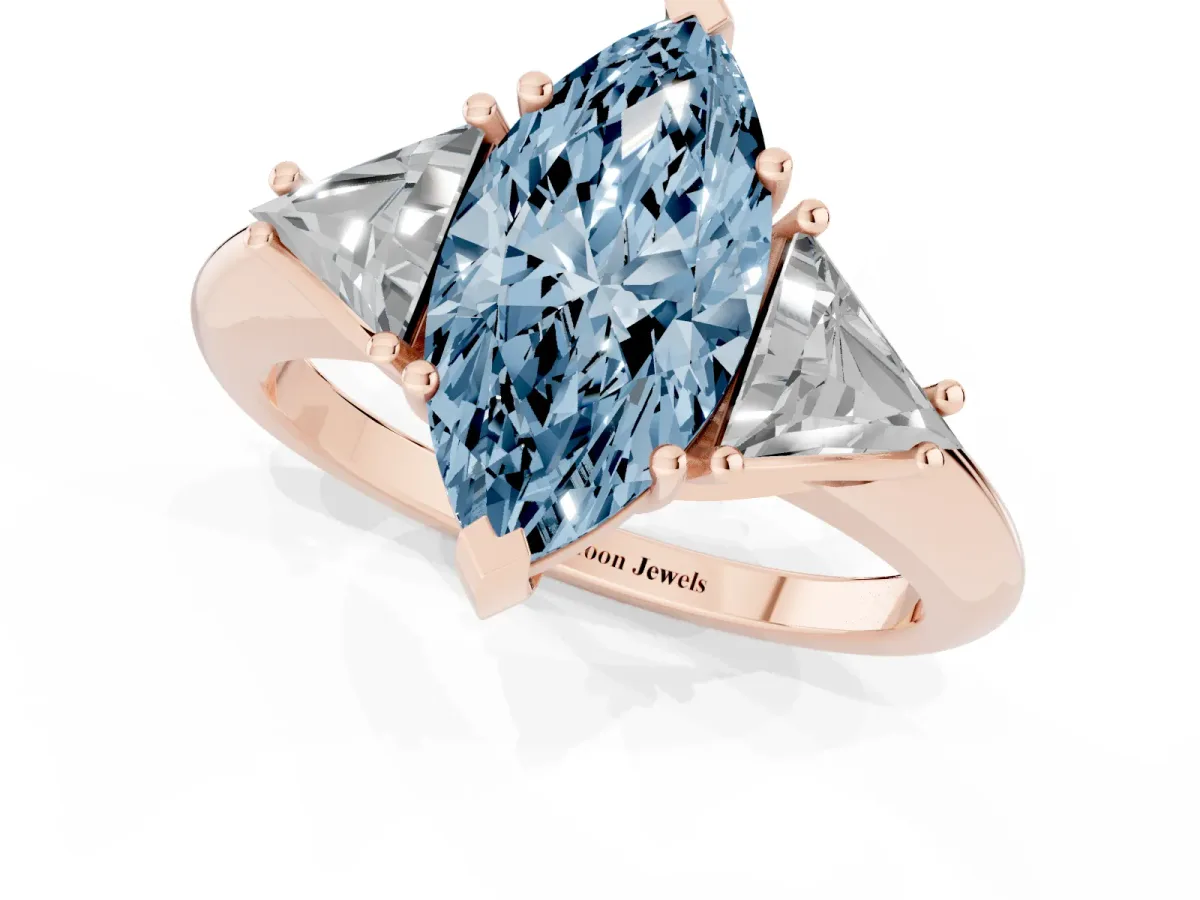 Fancy Blue Three-Stone Marquise Cut Diamond Engagement Ring with Trillion Side Stones and Prong Setting Rose gold