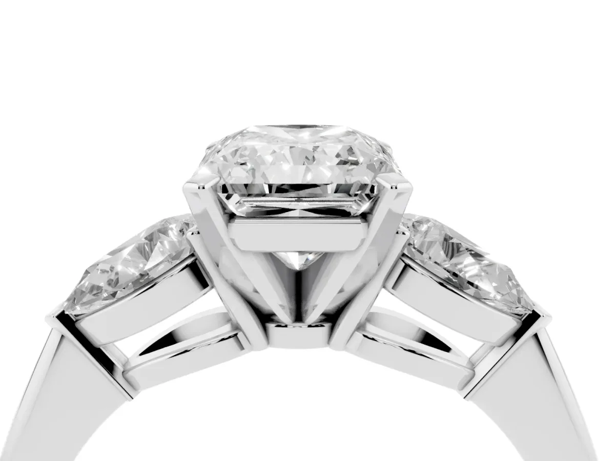 Three-Stone Radiant Cut Diamond Ring with Pear Side Stones and Four-Prong Setting Platinum