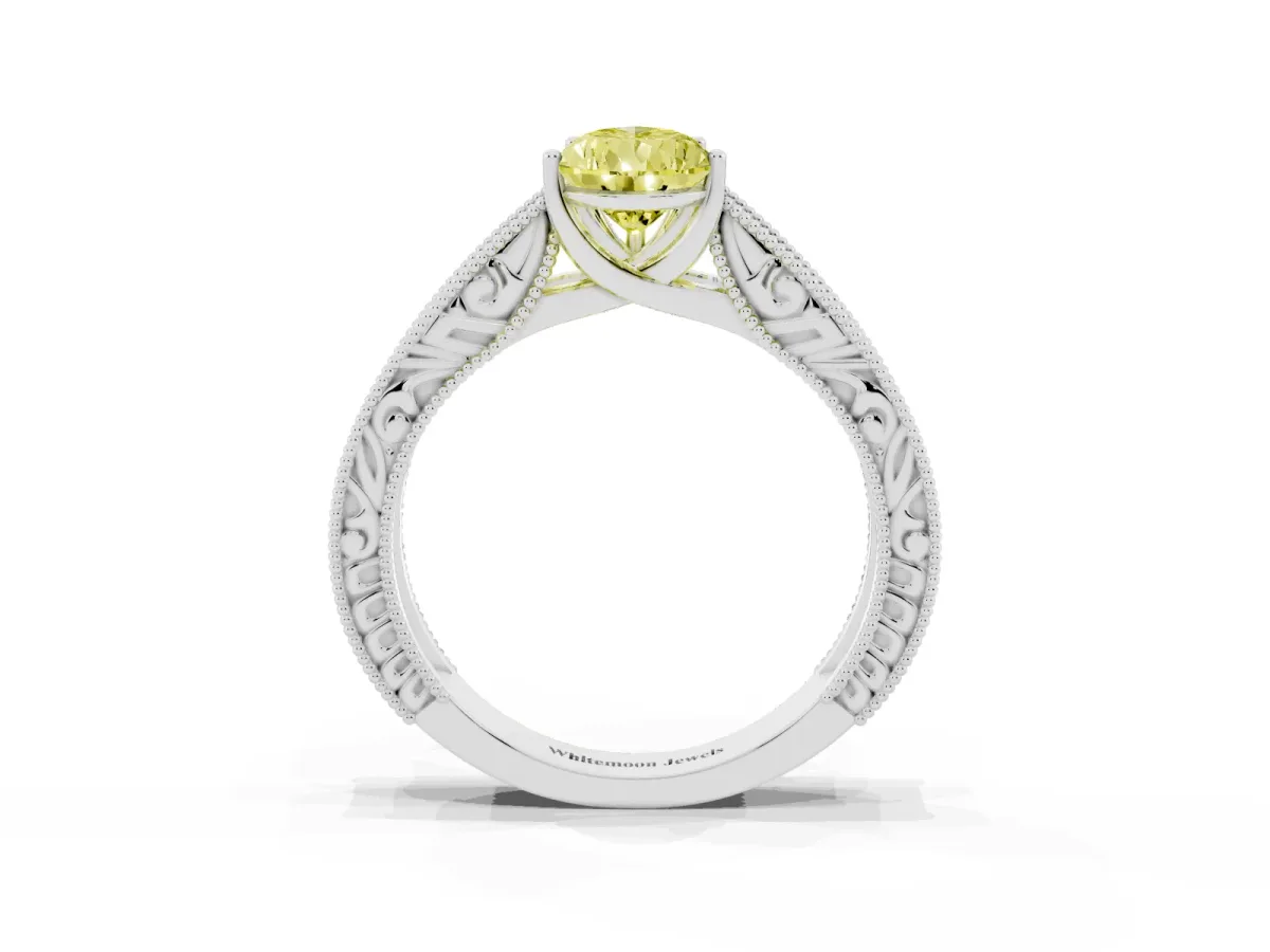 Fancy Yellow Pear Cut Diamond Solitaire Ring with Engraved Band and Four-Prong Setting Silver