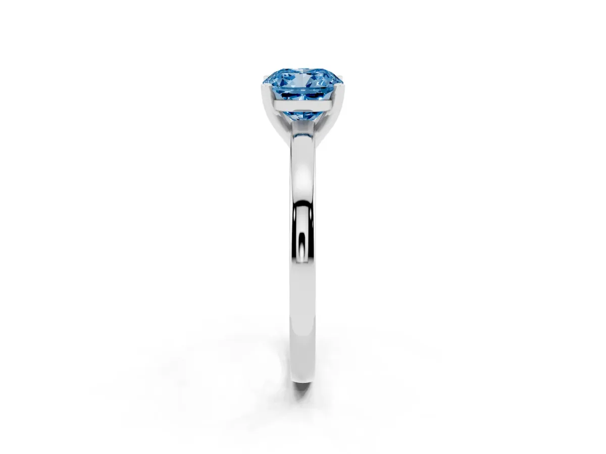 Fancy Blue Cushion Cut Solitaire Diamond Engagement Ring with Four-Prong Setting on a Classic Band Platinum
