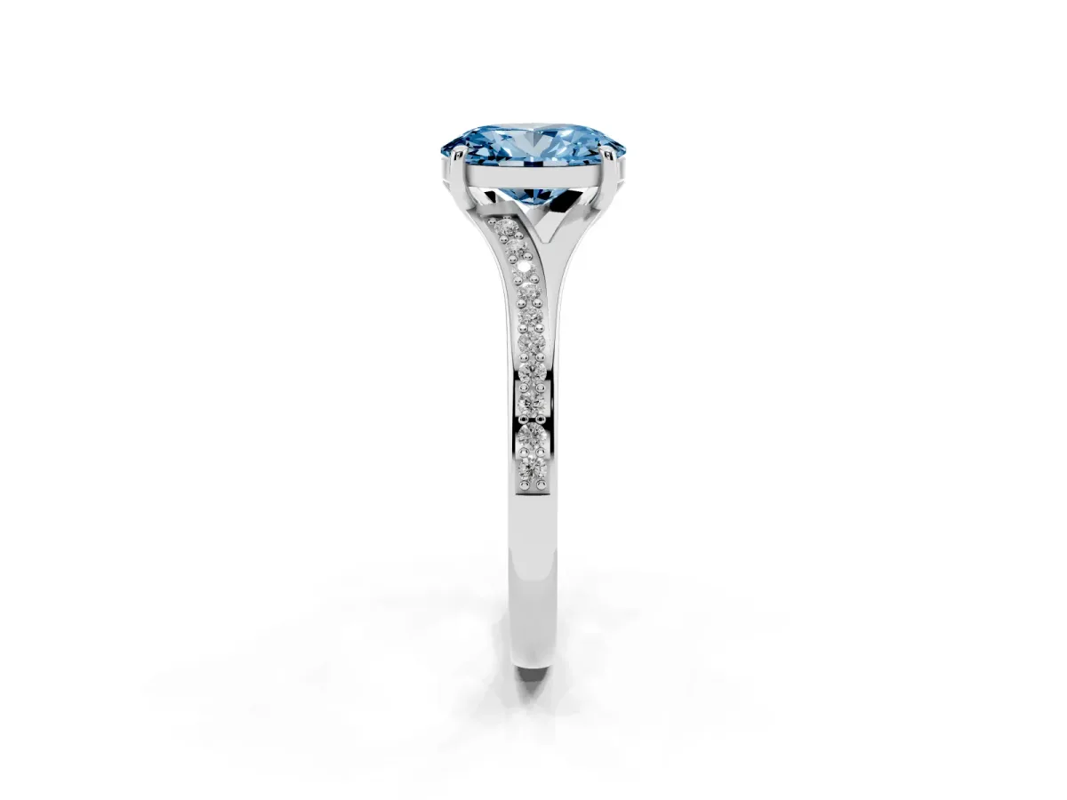 Fancy Blue Oval Cut Diamond Solitaire Ring with Pavé Band and Prong Setting Silver