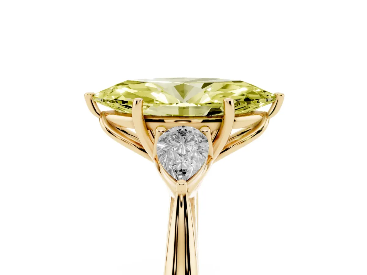 Fancy Yellow Three-Stone Marquise Cut Diamond Ring with Pear Side Stones in Four-Prong Setting Yellow gold