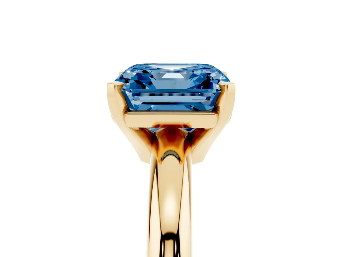 Fancy Blue Asscher Cut Diamond Solitaire Engagement Ring with Round Band and Four-Prong Setting Yellow gold