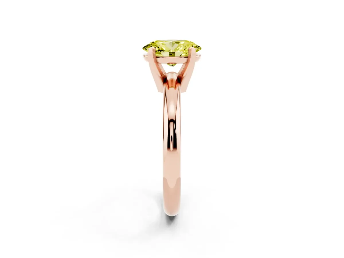 Fancy Yellow Oval Cut Diamond Solitaire Engagement Ring with Round Band and Four-Prong Setting Rose gold