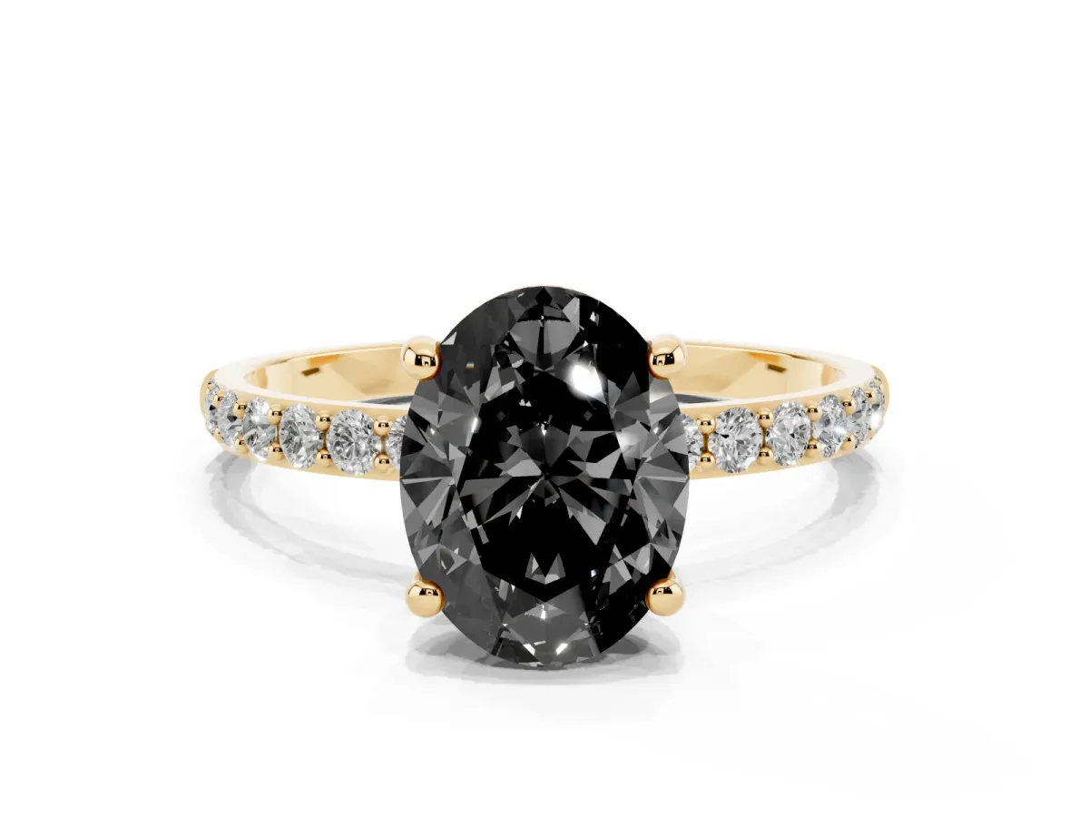 Fancy Black Oval Cut Diamond Solitaire Ring with Round Pavé Band and Prong Setting Yellow gold