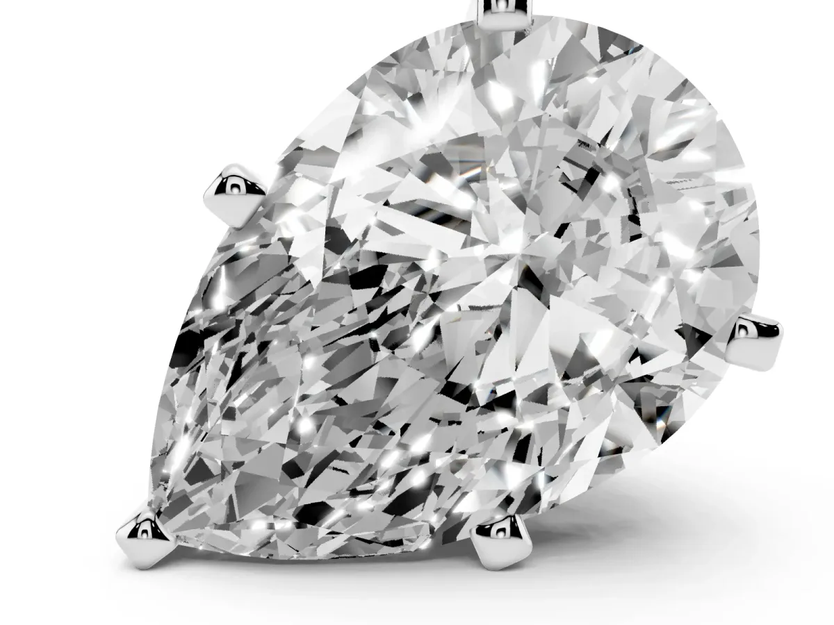 Pear Cut Diamond Solitaire Ring with Prong Setting and Classic Band White gold
