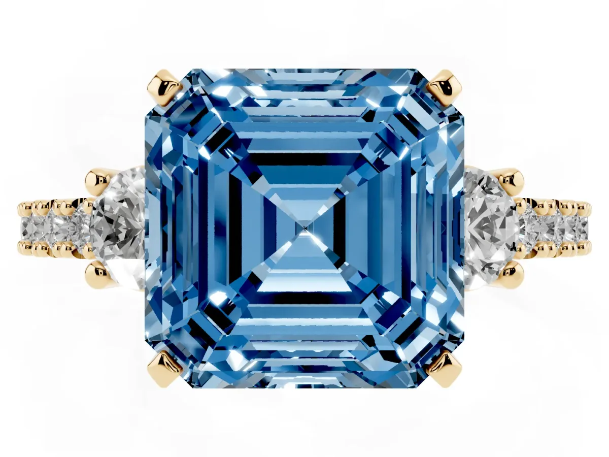 Fancy Blue Asscher Cut Three-Stone Diamond Pavé Band with Prong Setting Yellow gold