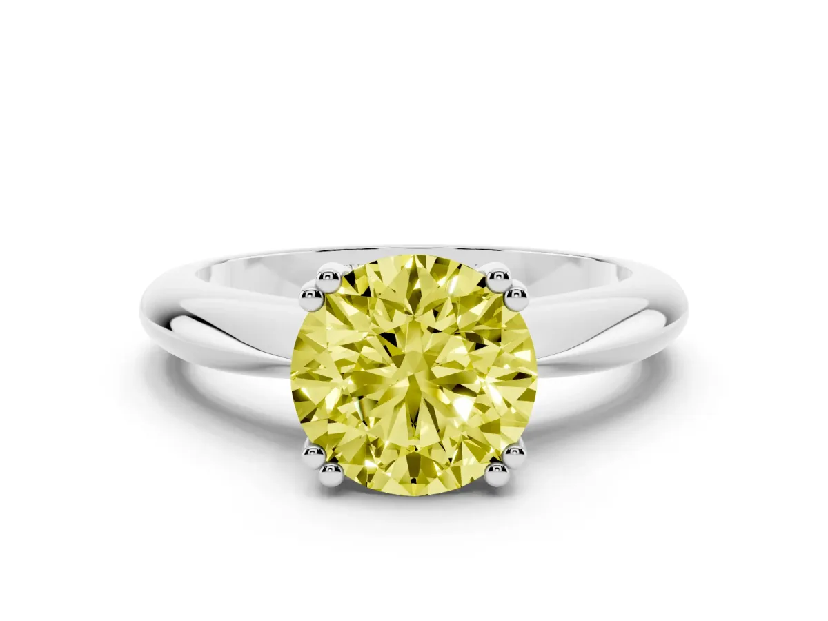 Fancy Yellow Round Cut Cut Solitaire Engagement Ring with Tapered Band and Four-Prong Setting Silver