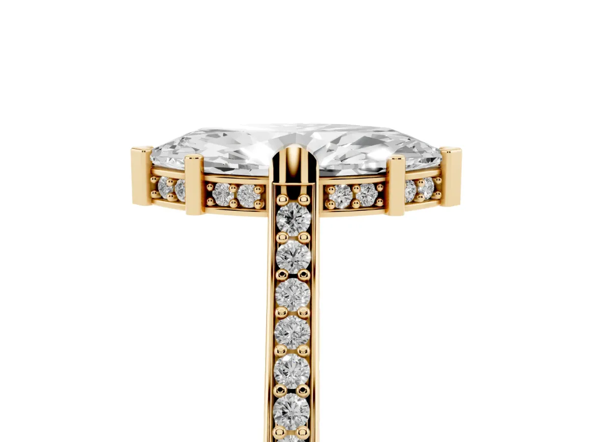 Marquise Cut Solitaire Diamond Ring with Channel Set Band and Bezel Prong Setting Yellow gold