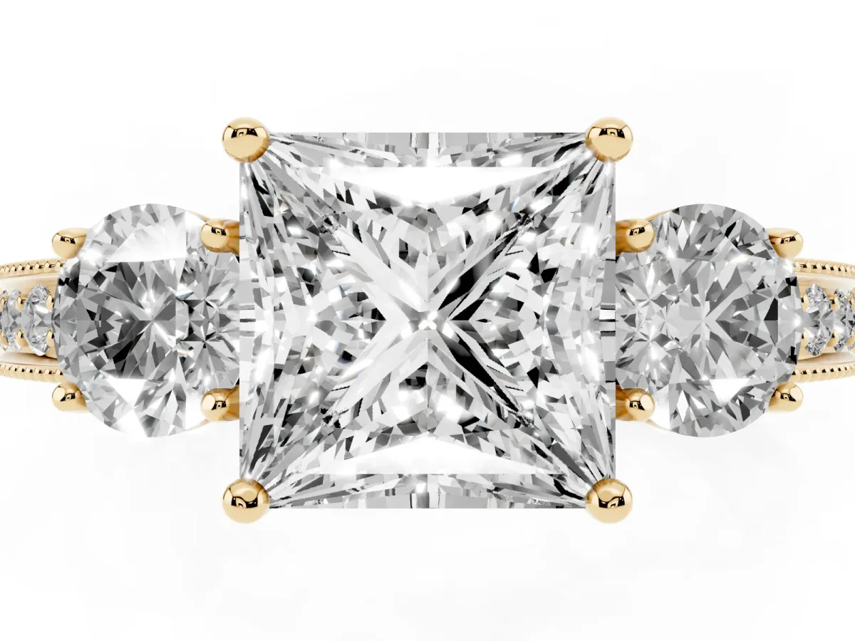 Princess Cut Three-Stone Diamond Ring with Pavé Band and Four-Prong Setting Yellow gold