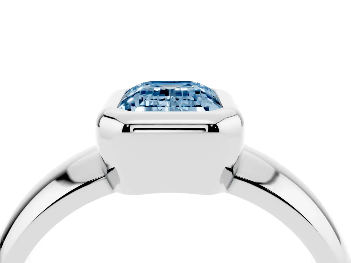 Fancy Blue Bezel Set Emerald Cut Solitaire Ring with Wide Band Platinum
