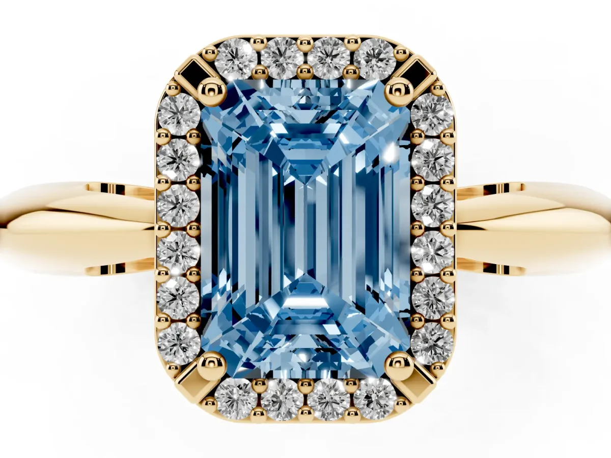 Fancy Blue Emerald Cut Cut Diamond Halo Engagement Ring with Split Shank and Four-Prong Setting Yellow gold