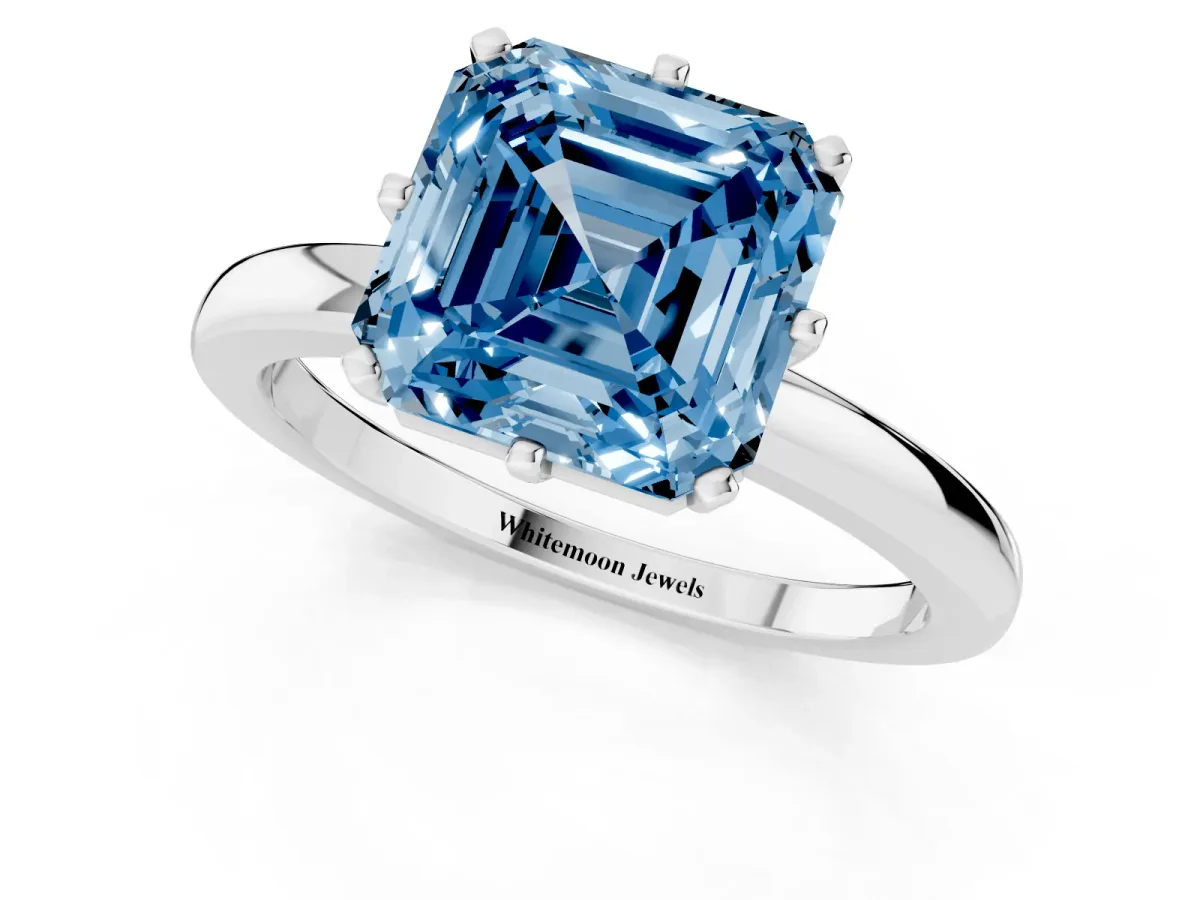Fancy Blue Asscher Cut Solitaire Diamond Ring with Six-Prong Setting on a Classic Band Silver