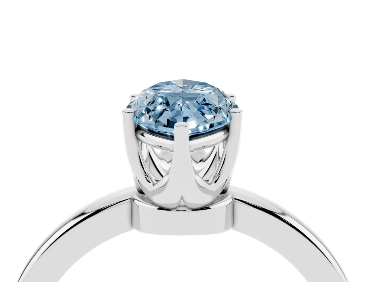 Fancy Blue Marquise Cut Solitaire Diamond Ring with Six-Prong Setting on a Classic Band Silver