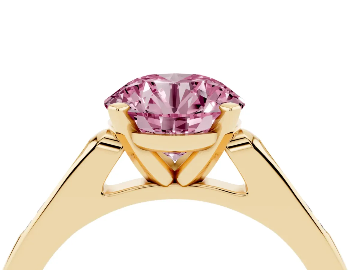Fancy Pink Round Cut Diamond Solitaire Ring with Channel Set Round Band and Prong Setting Yellow gold