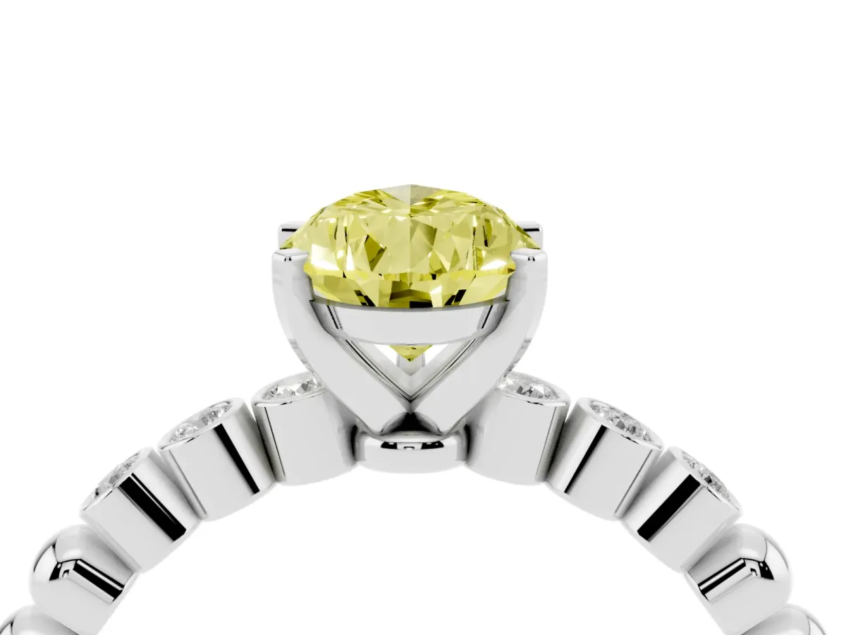 Fancy Yellow Pear Cut Solitaire Bezel Accent Diamond Engagement Ring with Beaded Band and Four-Prong Setting Platinum