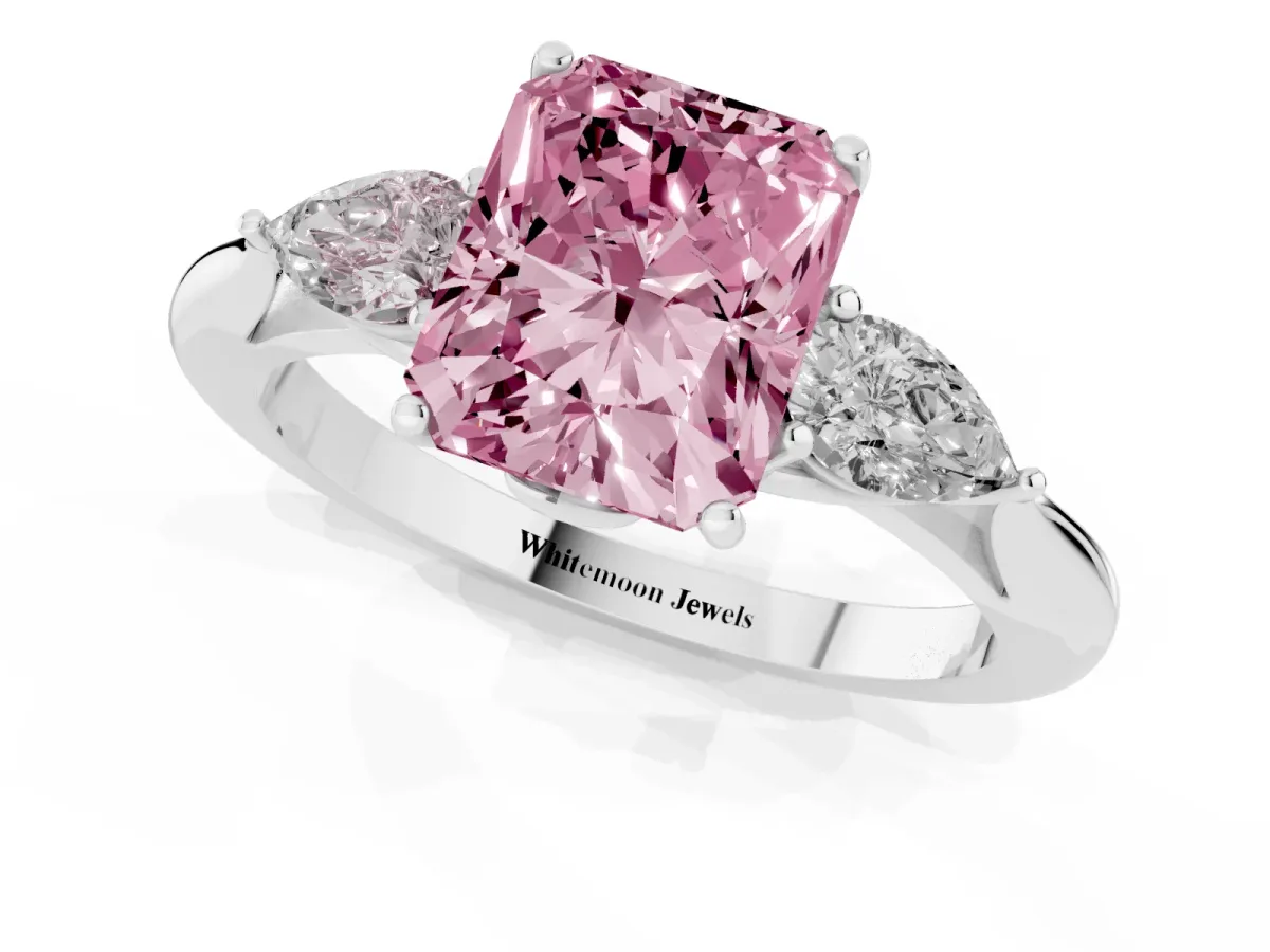 Fancy Pink Three-Stone Radiant Cut Diamond Ring with Pear Side Stones in Four-Prong Setting Silver