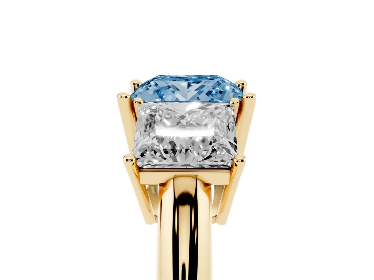 Fancy Blue Three-Stone Princess Cut Cut Diamond Engagement Ring with Prong Setting on a White Gold Band Yellow gold