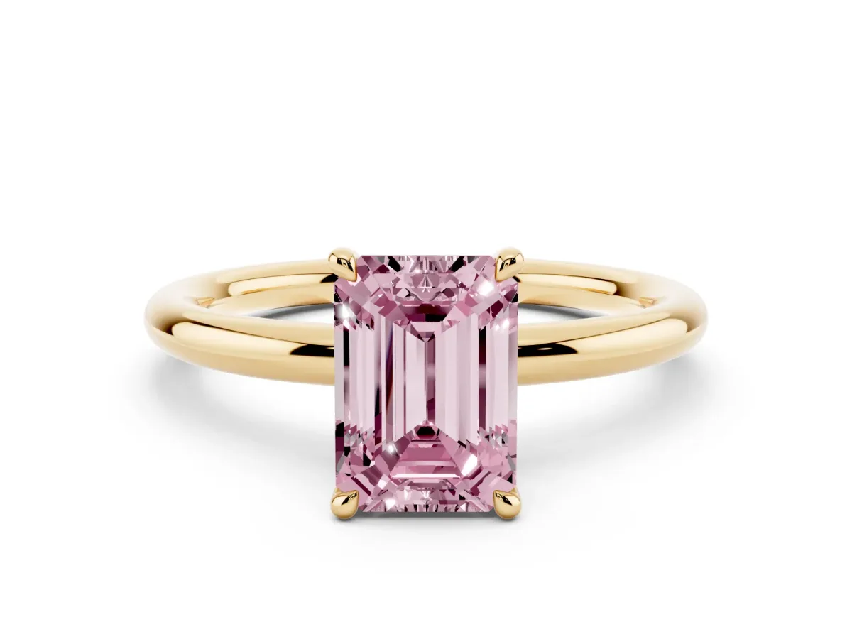 Fancy Pink Emerald Cut Diamond Solitaire Ring with Thin Band and Four-Prong Setting Yellow gold