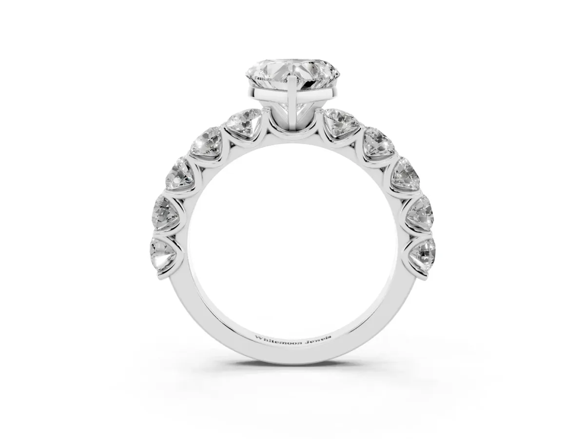 Heart Cut Diamond Prong Setting with Side Stones on a Pave Band Silver
