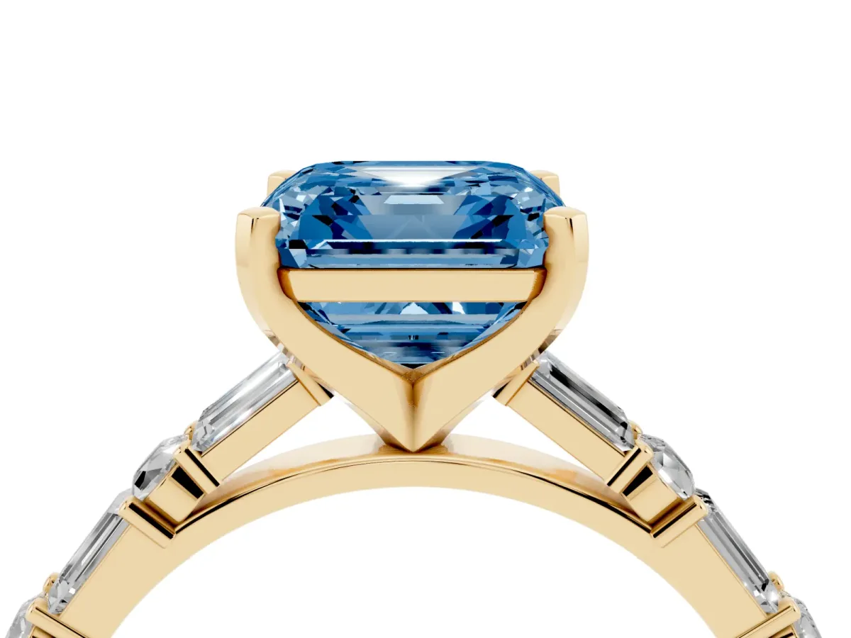 Fancy Blue Asscher Cut Diamond Solitaire with Side Baguettes and Channel Set Band Yellow gold