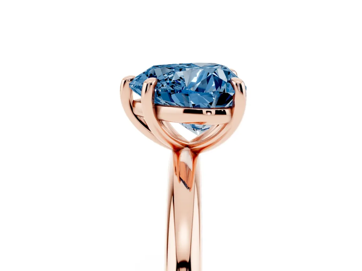 Fancy Blue Heart Cut Solitaire Diamond Ring with Four-Prong Setting on a Plain Band Rose gold