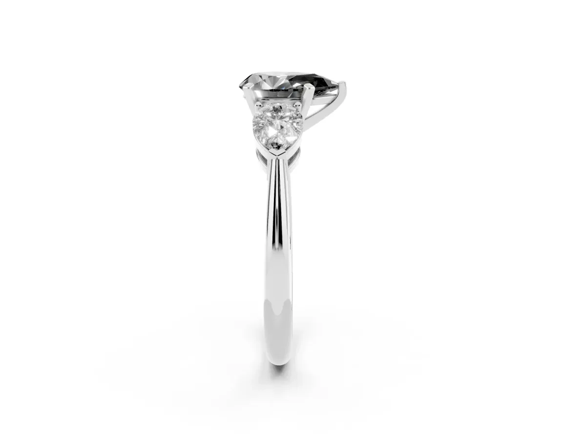 Fancy Black Three-Stone Pear Cut Diamond Ring with Pear Side Stones and Four-Prong Setting Platinum