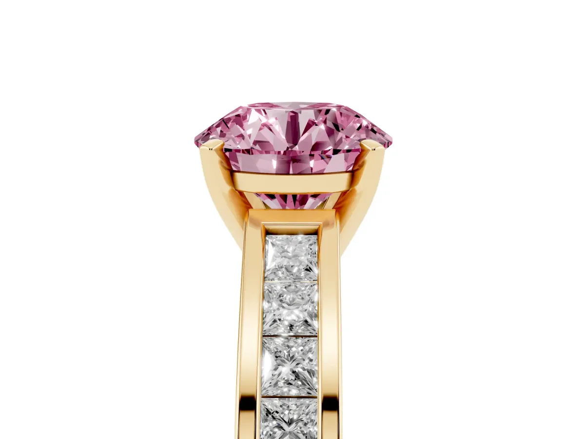 Fancy Pink Round Cut Solitaire Diamond Ring with Channel-Set Band and Four-Prong Setting Yellow gold