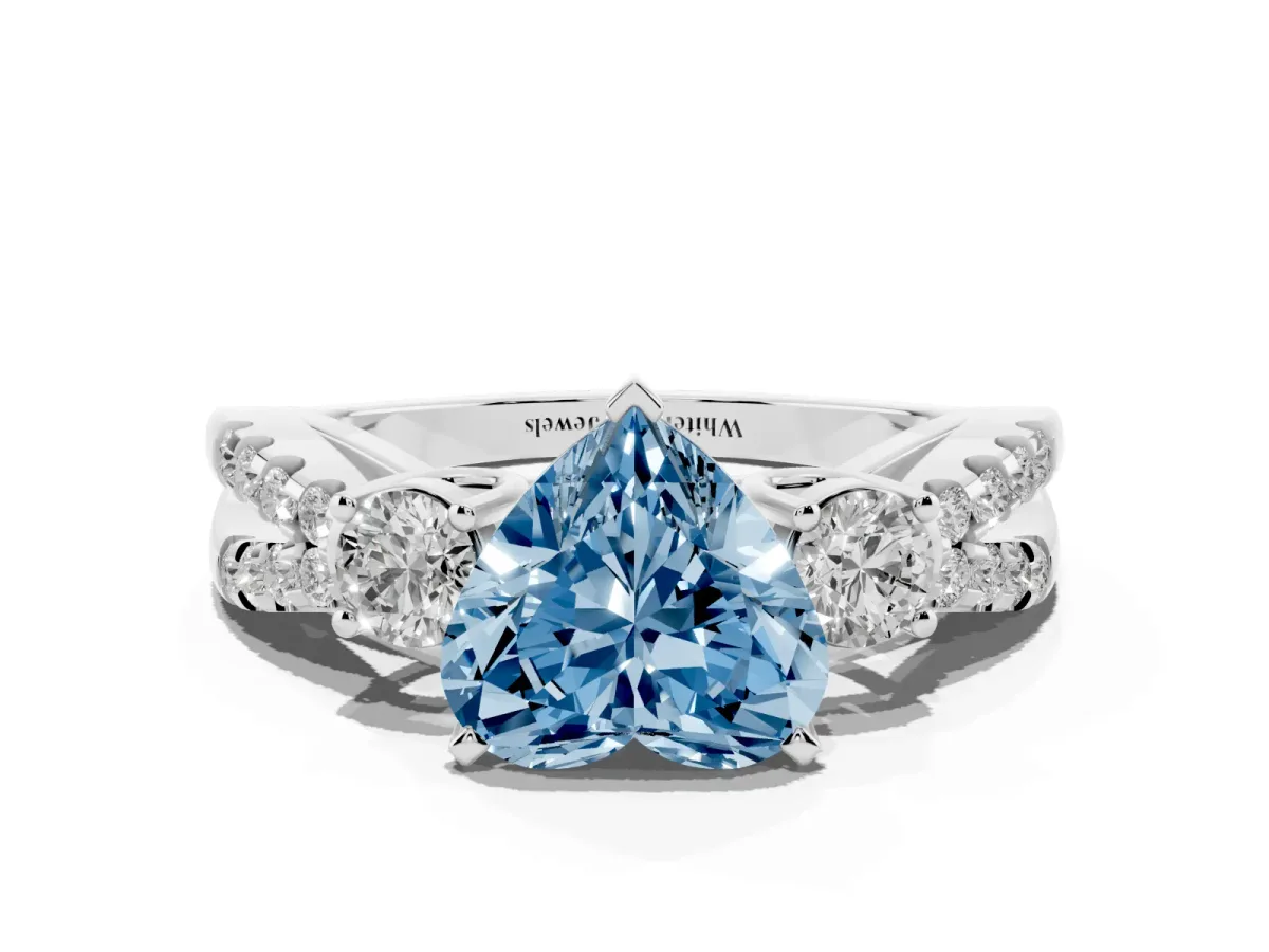 Fancy Blue Heart Cut Diamond Three-Stone Ring with Pavé Split Shank and Four-Prong Setting Silver