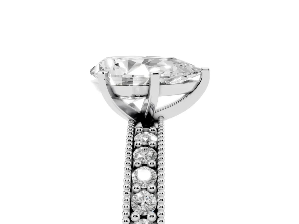 Pear Cut Diamond Milgrain Pavé Engagement Ring with Four-Prong Setting Silver
