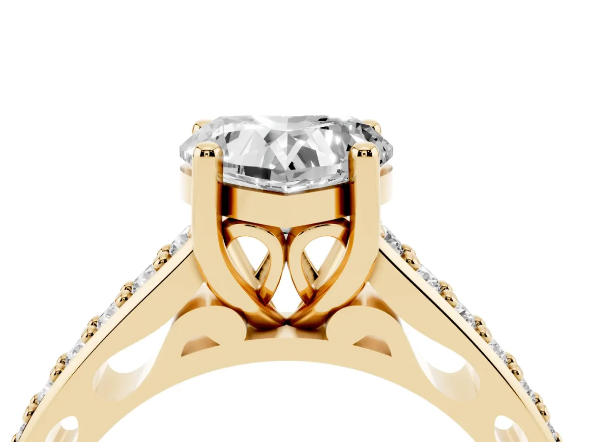 Heart Cut Solitaire Prong Set Diamond Engagement Ring with Pave Band Yellow gold