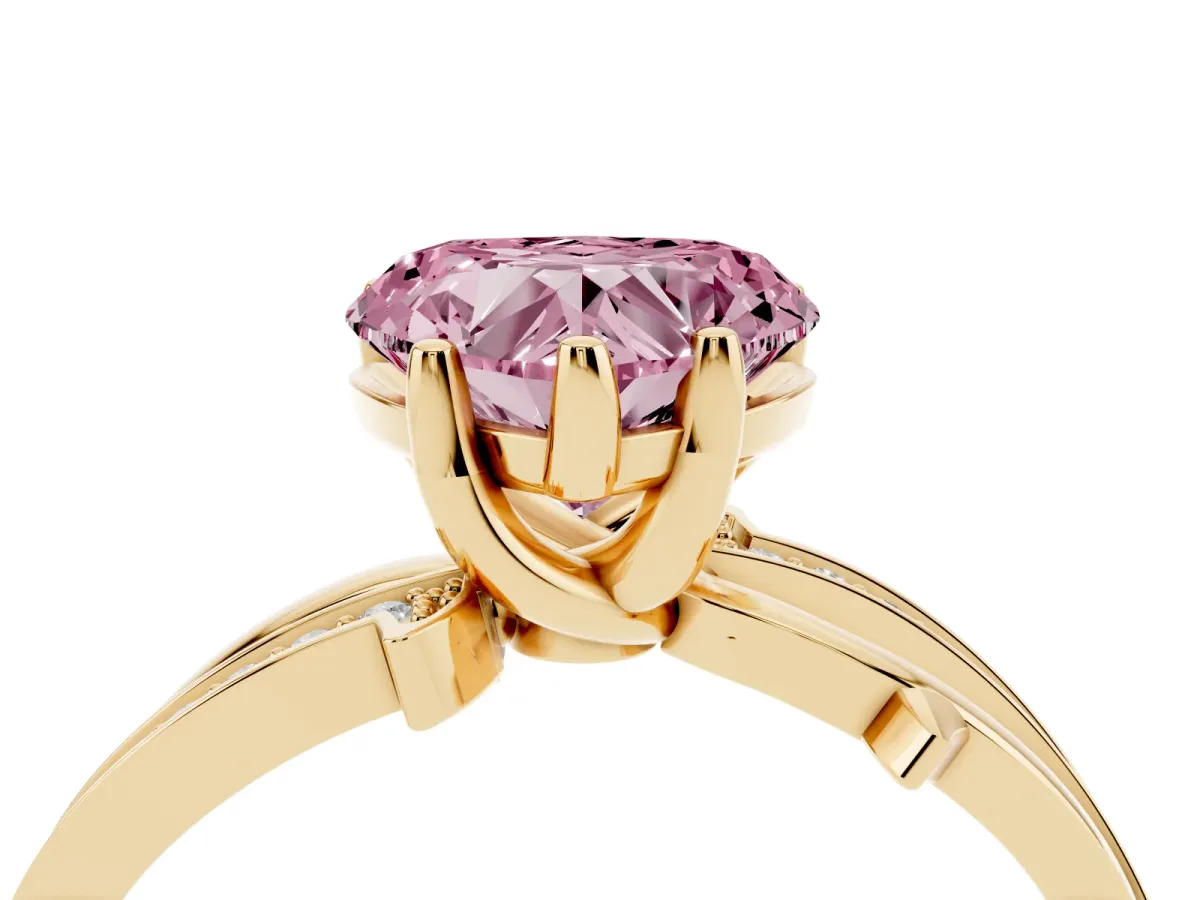 Fancy Pink Heart Cut Solitaire Twist Band with Pavé Accents and Four-Prong Setting Yellow gold