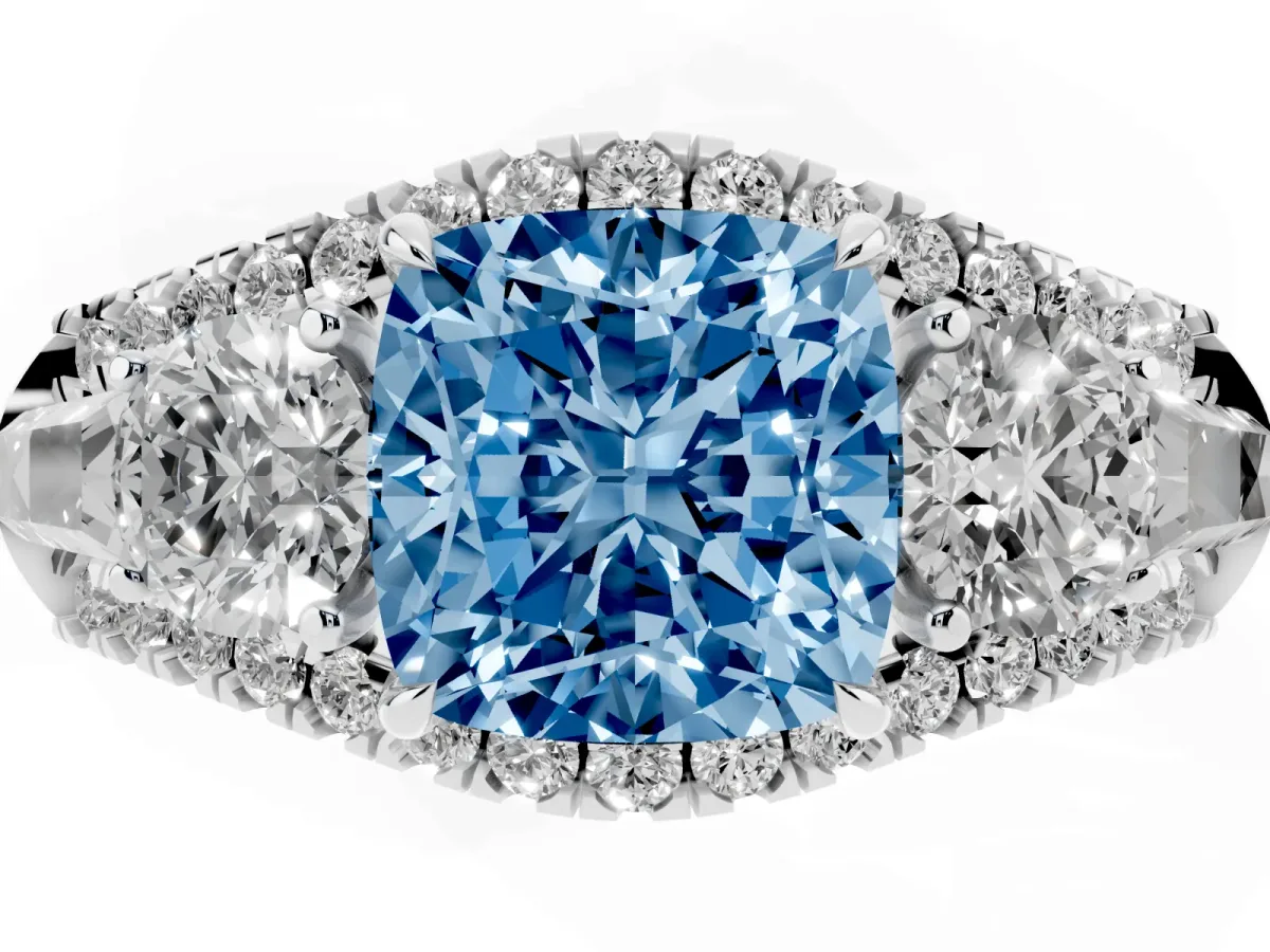 Fancy Blue Three-Stone Cushion Cut Diamond Engagement Ring with Pave Band and Prong Setting Platinum